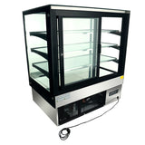 A commercial refrigerated display case with three interior glass shelves, a stainless steel base, LED lighting, and clear front, sides, and top. The unit features a digital control panel, electric cord, and sliding glass doors for easy access.