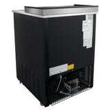 A commercial black beverage cooler with a hinged metal lid, forced-air cooling, ventilation grates on the lower sides, and electronic components with wiring visible behind a black wire guard on the bottom front. Several white information labels are attached to the unit.