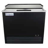 A commercial black and stainless steel Empura beer bottle cooler with a sliding top lid, similar to a stainless steel freezer. The front features the Empura logo on the upper left and a small recessed handle near the bottom right. The appliance appears sturdy and industrial.