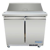 A stainless steel Empura refrigeration unit with two doors, a white countertop, and a raised back section. This refrigerated sandwich prep table features four caster wheels and is photographed against a white background.