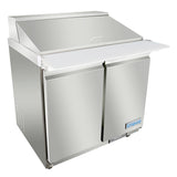 A stainless steel Empura refrigeration unit with two doors and a hinged top lid. This refrigerated sandwich prep table features a flat white prep surface, while the Empura brand name appears on the lower right door, set against a white background.
