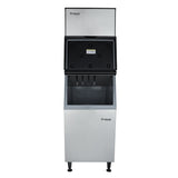A stainless steel Empura cube-style ice maker with an open top lid reveals the inner ice-making compartment and control panel. The machine stands on four black legs and features a lower commercial ice bin with the Empura logo on the front.
