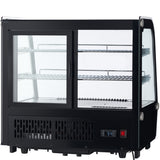 An Empura refrigeration countertop display refrigerator in black and silver features sliding glass doors, two wire shelves, a vented base, and a digital temperature display reading 3.5°C, all set against a white background.