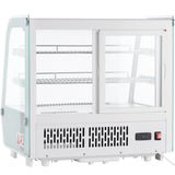 A commercial Empura refrigeration countertop display refrigerator with clear glass sides, front sliding doors, two wire shelves, a vented lower section, digital temperature display, and power switch—perfect for showcasing and keeping food items cool.