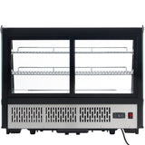 A refrigerated display case with two front glass sliding doors, three metal wire shelves, and a stainless steel vented base featuring a digital temperature display and power switch. The Empura refrigerated display includes a black power cord at the bottom right.