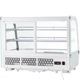 This Empura refrigeration countertop display case features glass sides and front, two wire shelves, and a digital temperature display reading 4.8°C. Vented panels and sliding glass doors at the back provide easy access to the shelves.
