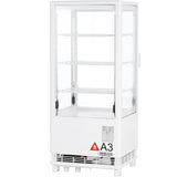 A white, upright refrigerated display case with glass panels on all sides, three adjustable wire shelves, and a vented base. A warning label marked A3 and a caution symbol are visible on the lower front panel. The fridge is empty.