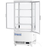 A white Empura refrigerated display case with a glass door open, showing three adjustable wire shelves inside. The unit features Empura refrigeration, a digital display on the bottom right, a visible power cord, and the Empura logo on the front.