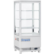 A white Empura E-RDC-17W-2D countertop display refrigerator with four glass sides, three interior shelves, and a clear door. This refrigerated display case features vents, control buttons, and warning labels on the empty, clean unit.