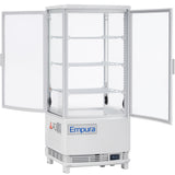 A white Empura refrigeration display refrigerator with two open glass doors, four wire shelves, and a digital temperature display at the bottom front. The interior is empty, and the refrigerated display case stands on short legs with warning labels on the lower left side.