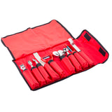 A red fabric roll-up case with eight kitchen tools, each in its own pocket. This garnish set includes utensils with ergonomic handles—like a zester, peeler, and melon baller—all neatly arranged for convenient use.