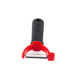 A Y peeler with a black, textured handle and a red plastic frame. This ergonomic peeler features a horizontal stainless steel blade, a small hanging hole at the end, and is set against a white background.