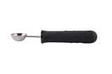A stainless steel melón baller with a round, silver scoop and a thick, textured ergonomic handle is shown on a white background, positioned horizontally with the scoop on the left and the handle on the right.