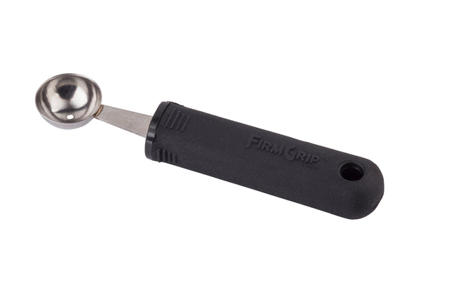A stainless steel melón baller with a round scooping end and an ergonomic, black rubberized handle that reads FIRM GRIP. The handle features a hole at the end for hanging. The tool is isolated on a white background.