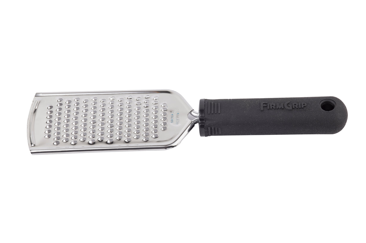 A stainless steel handheld grater with a flat, rectangular grating surface featuring small holes and a black, ergonomic handle labeled FIRM GRIP. The handle has a hole at the end for hanging.