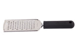 The FirmGrip Grater is a flat stainless steel grater with an ergonomic handle for comfort. Its oval holes shred cheese or veggies easily, and a hole at the end of the handle allows for simple hanging and storage.