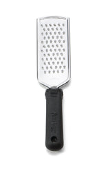 A stainless steel grater with a rectangular surface featuring medium-sized holes and an ergonomic handle with a textured grip. The handle, embossed with the Farberware name, offers comfort and control—perfect as your FirmGrip Grater.