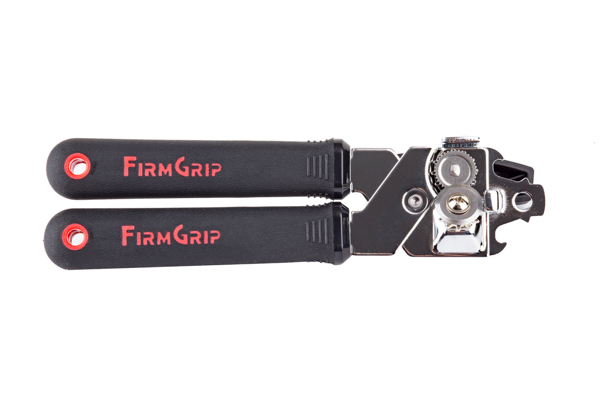 A black-handled FirmGrip Hand Can Opener with FIRM GRIP printed in red on both parallel handles. The stainless steel can opener’s cutting mechanism, with visible gears and a rotating blade, is clearly shown on the right side.