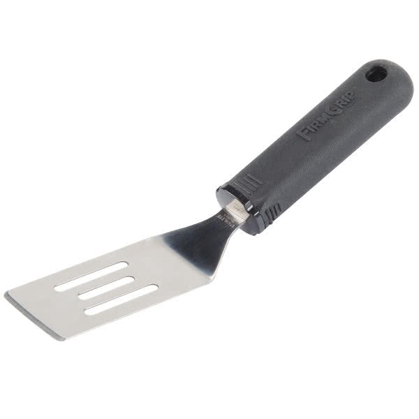 A FirmGrip spatula with a short, wide, slotted metal blade and black plastic handle featuring a hanging hole. The ergonomic spatula design and angled blade make lifting and flipping food easy.