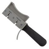 The FirmGrip Hand Held Sharpener by TableCraft features a black textured handle, a gray sharpening head with “1 SHARPEN” and “2 HONE” slots, and a curved guard for protection. Its design is dishwasher safe for easy cleaning.