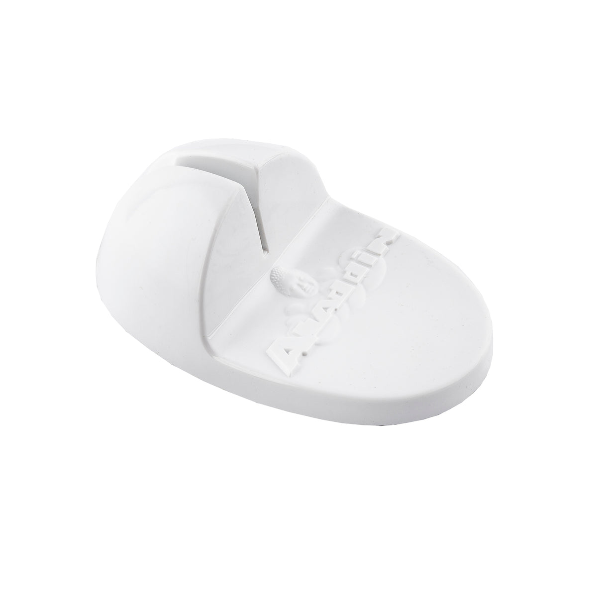 A white, oval-shaped plastic object with a central slot and raised ridge, featuring embossed text and a small logo. The base is flat and smooth, while the upper part arches slightly. It appears to be a TableCraft Knife Sharpener.