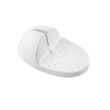 A white, oval-shaped plastic object with a central slot and raised ridge, featuring embossed text and a small logo. The base is flat and smooth, while the upper part arches slightly. It appears to be a TableCraft Knife Sharpener.
