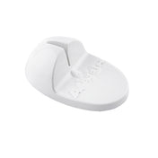A white, oval-shaped plastic object with a central slot and raised ridge, featuring embossed text and a small logo. The base is flat and smooth, while the upper part arches slightly. It appears to be a TableCraft Knife Sharpener.