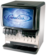 A commercial countertop beverage dispenser labeled “Cornelius” with a blue water splash graphic, featuring eight sanitary lever valves and a transparent ice chute above a drip tray. The Ice & Post-Mix Beverage Dispenser is black and stainless steel.