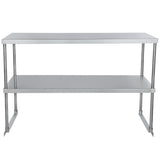 A stainless steel table with a flat rectangular top, four cylindrical legs, and a lower shelf for additional storage. This minimalistic, industrial table is ideal for kitchens or workspaces and can accommodate an Overshelf for added organization.
