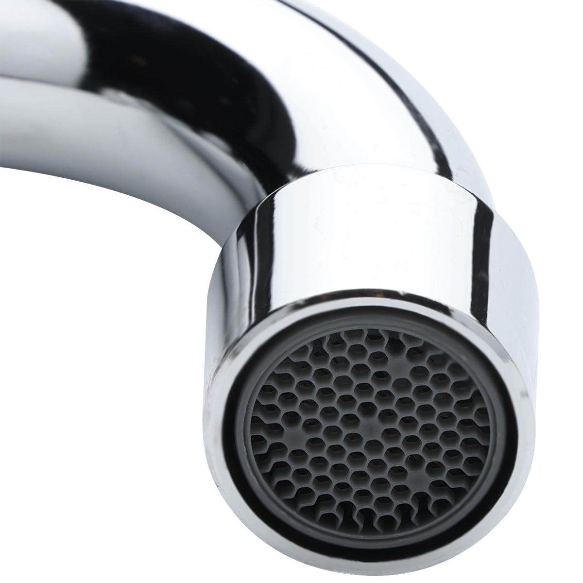A close-up view of the end of a shiny, stainless chrome faucet shows the aerators honeycomb-like mesh pattern. The faucet curves downward, reflecting light on its metallic surface. The background is plain and out of focus.