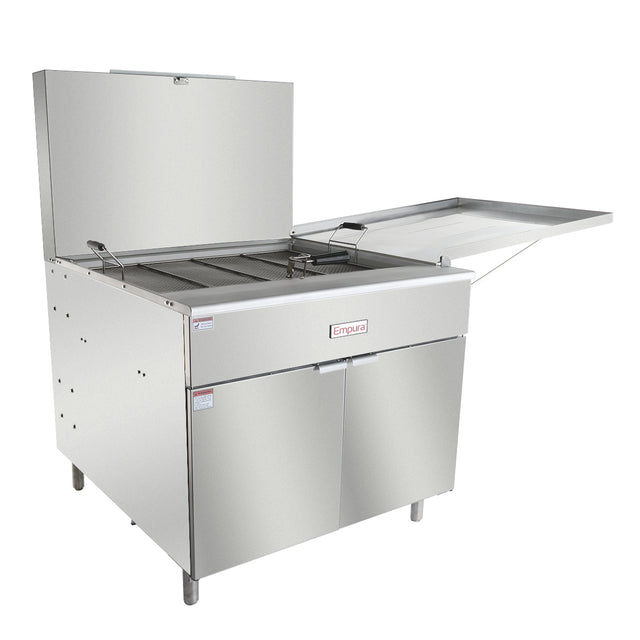 A commercial stainless steel Empura donut fryer with 220 lb oil capacity, featuring two baskets, an open lid, sturdy legs, a right-side tray, and two cabinet doors below. Ideal for high-volume frying and compatible with liquid propane setups.