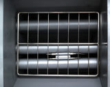 A close-up view of the interior of a commercial gas fryer shows horizontal metal rods and a wire rack above them. The central component, with two white insulated connectors and a metallic bar, suggests a heating element for this 40 lb capacity appliance.
