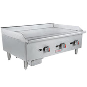 A stainless steel countertop griddle with three red and black control knobs, branded Empura. It has four sturdy legs, a flat cooking surface, raised side and back splashes, and a front-mounted grease tray beneath the controls.