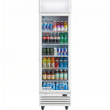 A tall, single-door commercial refrigerated merchandiser with a glass front, stocked with assorted beverages: water, sodas, energy drinks, sports drinks, iced tea, and juices neatly arranged on shelves. White fridge with a lighted sign and wheels at the bottom.