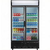 A Refrigerated Merchandiser with glass swing doors, stocked with assorted drinks like Coca-Cola, Sprite, Monster Energy, and Gatorade, all neatly arranged on five shelves. The commercial refrigerator brand is Empura.