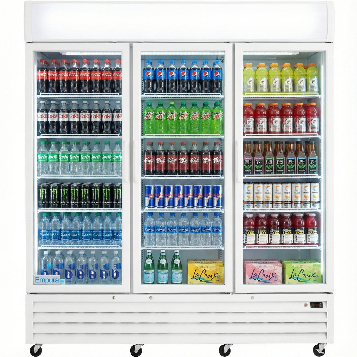 A three-door Glass Swing Door Cooler filled with assorted beverages—sodas, sports drinks, sparkling water, energy drinks, and LaCroix—arranged in neat rows by type and color. The Refrigerated Merchandiser features a white exterior and glass doors.