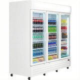 A large commercial refrigerator with three sliding glass doors displays neatly arranged drinks, including soda cans, bottles, energy drinks, and juice boxes. The shelves are well-lit and the refrigerated merchandiser is on wheels, set against a white background.