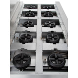 A close-up view of the interior of a double base gas range, featuring eight black circular gas burner heads in two rows within a metallic silver frame—a prime example of reliable commercial kitchen equipment.