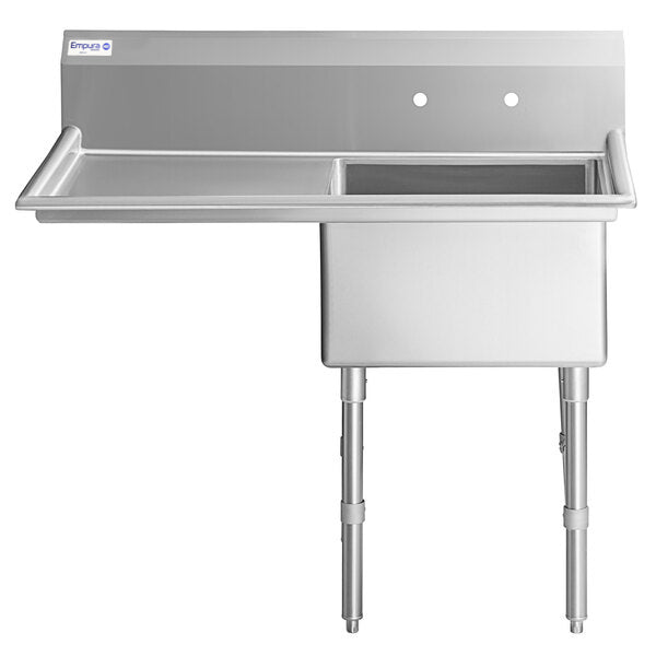 A stainless steel commercial sink with one deep rectangular basin on the right, a flat drainboard on the left, two faucet holes in the back panel, and sturdy tubular legs. This NSF sink features a clean, unused surface for demanding environments.