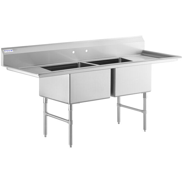 A commercial kitchen sink with two deep rectangular basins, side drainboards, backsplash, and tall metal legs; this heavy-duty stainless steel 2 compartment sink features two faucet holes centered on the backsplash for superior kitchen performance.
