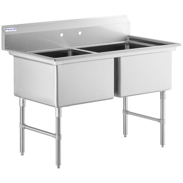 A stainless steel commercial kitchen sink featuring a double-basin, high backsplash, and four sturdy legs. This 2 compartment sink has rounded corners, visible faucet mounting holes, and a clean, industrial look ideal for kitchens or food service environments.