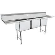 A large, NSF 3 compartment stainless steel sink with a backsplash, two drainboards on either side, and sturdy metal legs. This heavy duty sink is empty and designed for commercial kitchen or industrial use.