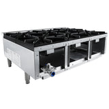 A commercial stainless steel gas hot plate with six heavy-duty cast iron top grates, elevated on four sturdy legs. Visible control valves are on the front, and there’s no oven beneath. Designed for professional kitchen countertop installation.