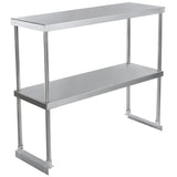 A two-tier stainless steel overshelf with rectangular shelves supported by cylindrical metal legs. The lower shelf is attached to vertical supports, and the open design allows storage or workspace underneath. The smooth, reflective surface adds a sleek touch.