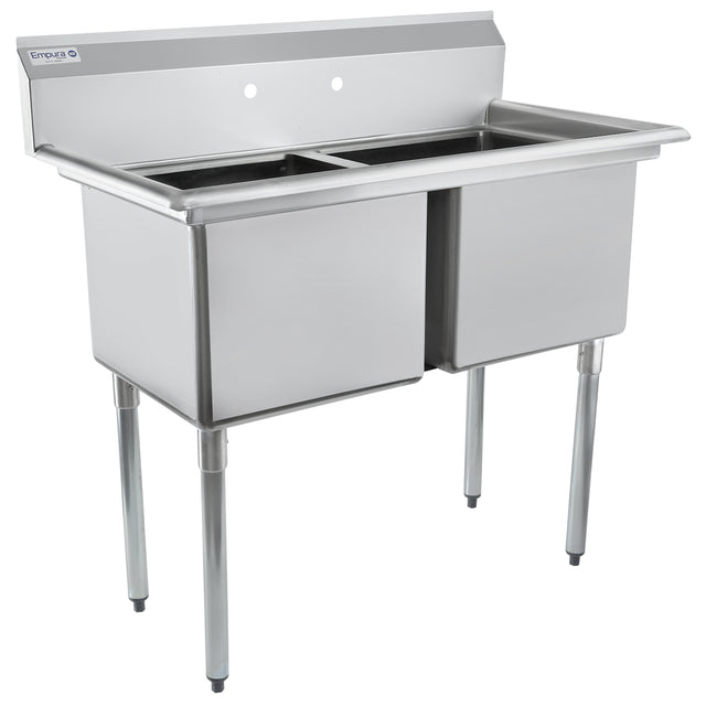 A stainless steel 2 compartment sink with deep rectangular basins, a high backsplash with two faucet holes, and sturdy tubular legs. This NSF sink is clean and empty, perfect for food service or industrial use.
