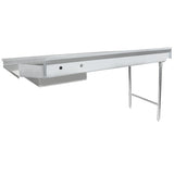 A long, rectangular stainless steel commercial sink with a backsplash features a deep pre-rinse bowl on the left and two supporting metal legs on the right. The flat right side acts as a stainless steel worktop or soiled dishtable. Background is plain white.