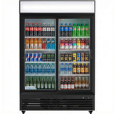 A merchandiser refrigerator displays assorted bottled and canned drinks, including Coca-Cola, Pepsi, Red Bull, juices, sparkling water, and iced teas—all neatly arranged on metal shelves for optimal refrigerated storage.