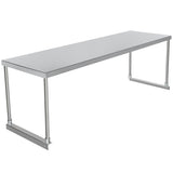 A long, rectangular stainless steel table with a smooth, flat top and four straight metal legs connected by horizontal supports near the floor. Its simple, industrial design can be enhanced with a table-mounted overshelf for added storage in kitchens or workspaces.