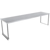 A long, rectangular stainless steel table with a flat top and four straight legs features a minimalist design and shiny surface. Suitable for industrial or commercial kitchens, it can be upgraded with a table-mounted overshelf for extra storage.