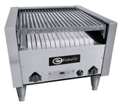 A commercial stainless steel countertop charbroiler with metal grates, two front control knobs, sturdy legs, and an EmberGlo logo. White ceramic briquettes sit beneath the grates. The grill is photographed on a plain white background.